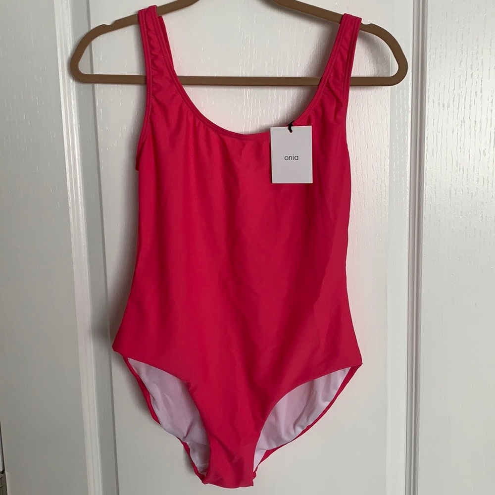 Onia Hot Pink one piece swim suit XL. Swim sizes run small. I am a M in clothes